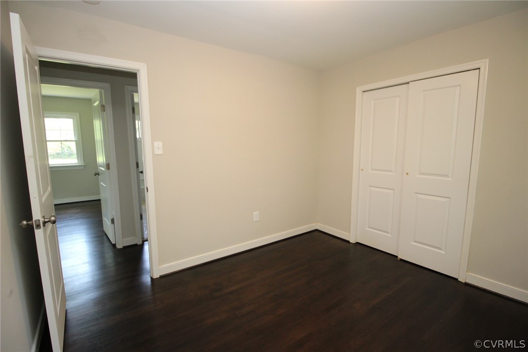 923 Schroeder Road Powhatan, VA 23139 - Photo 19 of 32 Front middle BR w/ large closet & refinished hardw