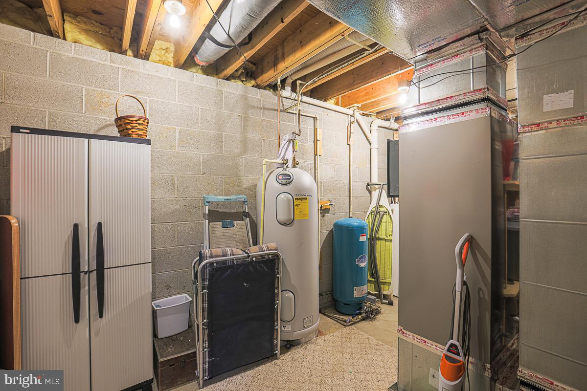 3899 Bixler Church Road Westminster, MD 21158 - Photo 27 of 42 a view of storage and utility room with refrigerator
