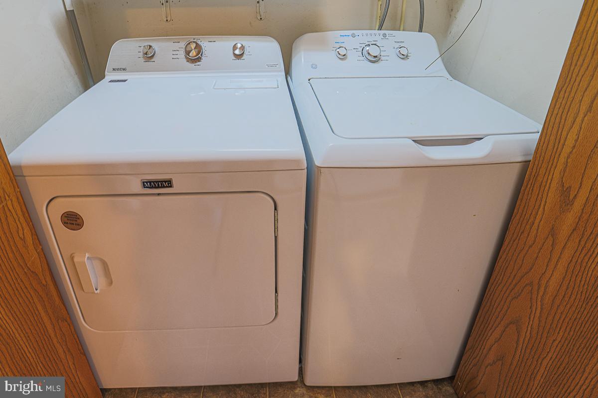 3899 Bixler Church Road Westminster, MD 21158 - Photo 28 of 42 a utility room with dryer and washer