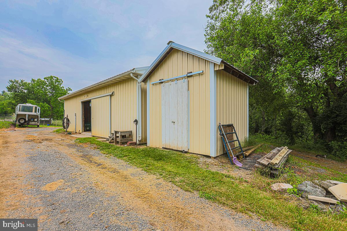3899 Bixler Church Road Westminster, MD 21158 - Photo 34 of 42 a view of a house with backyard and trees