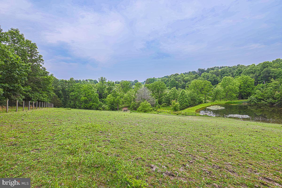 3899 Bixler Church Road Westminster, MD 21158 - Photo 40 of 42 a view of a green field with clear sky