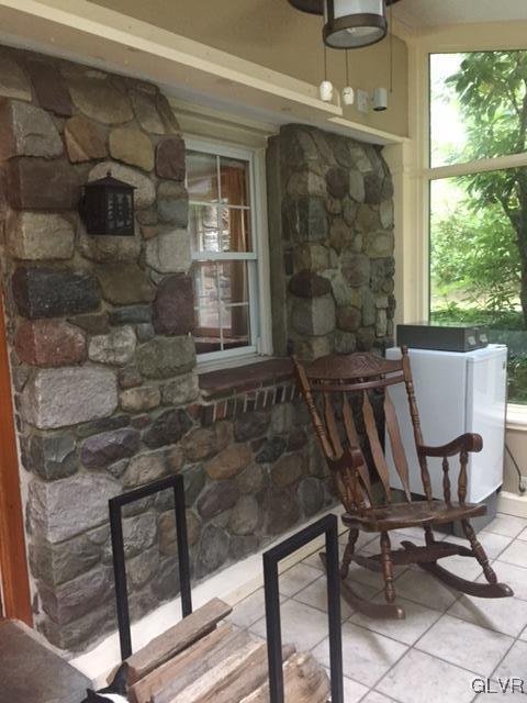 308 Frailey Road Stroudsburg, PA 18360 - Photo 12 of 42 a view of a chair and table in the balcony