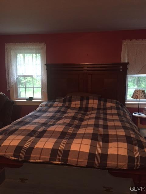 308 Frailey Road Stroudsburg, PA 18360 - Photo 23 of 42 a bedroom with a bed and window
