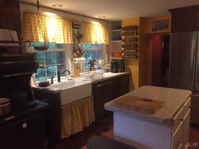 308 Frailey Road Stroudsburg, PA 18360 - Photo 5 of 42 a kitchen with a sink refrigerator and microwave