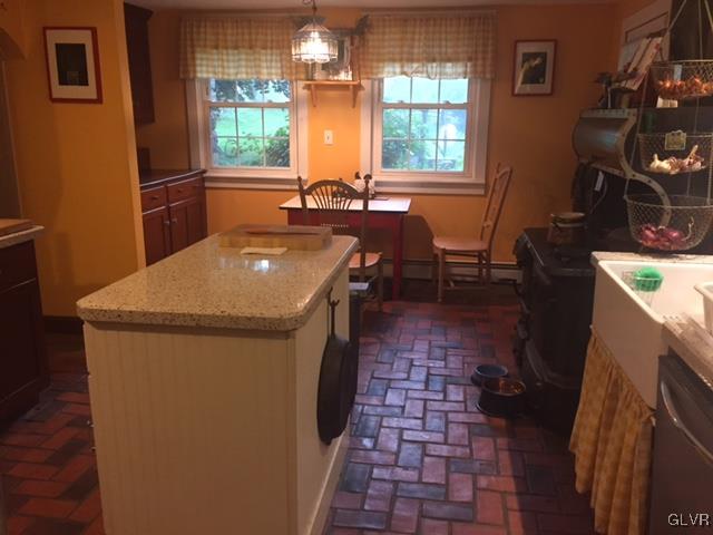 308 Frailey Road Stroudsburg, PA 18360 - Photo 7 of 42 a kitchen with a sink a counter top space and a window
