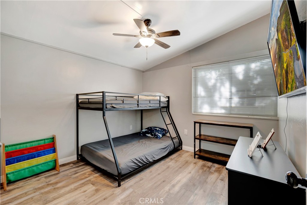 1770 Wright Street Pomona, CA 91766 - Photo 15 of 70 a living room with furniture and a ceiling fan