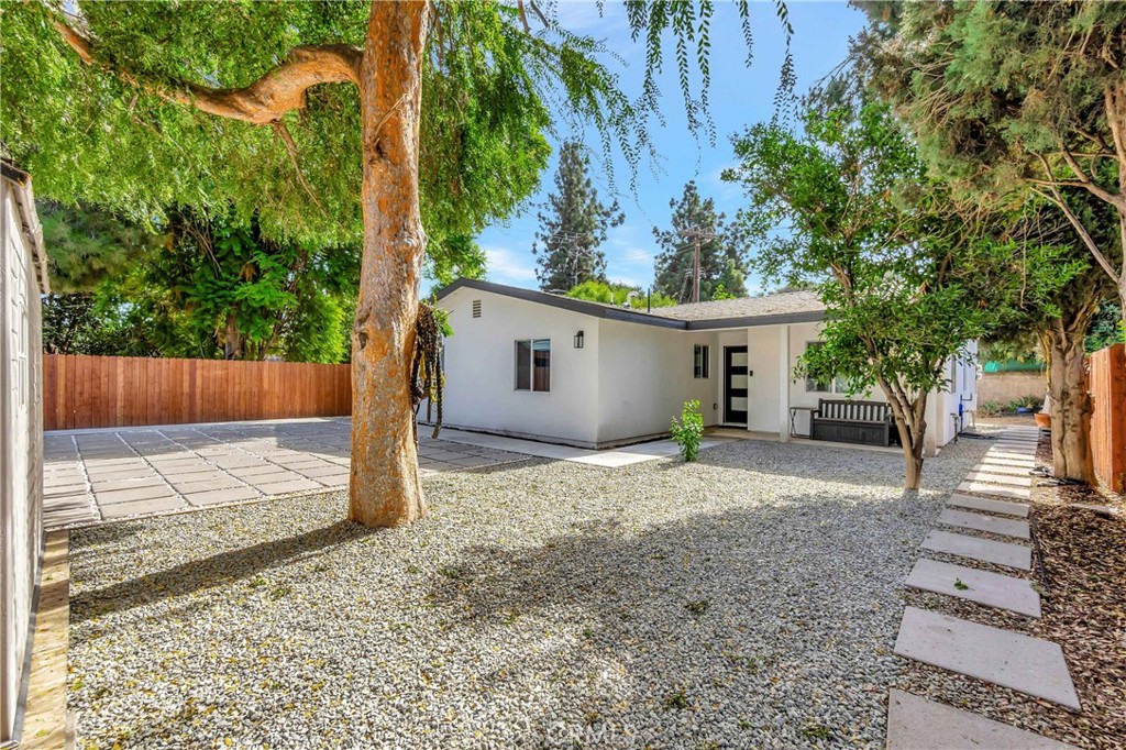 1770 Wright Street Pomona, CA 91766 - Photo 29 of 70 front view of a house with a yard and an trees