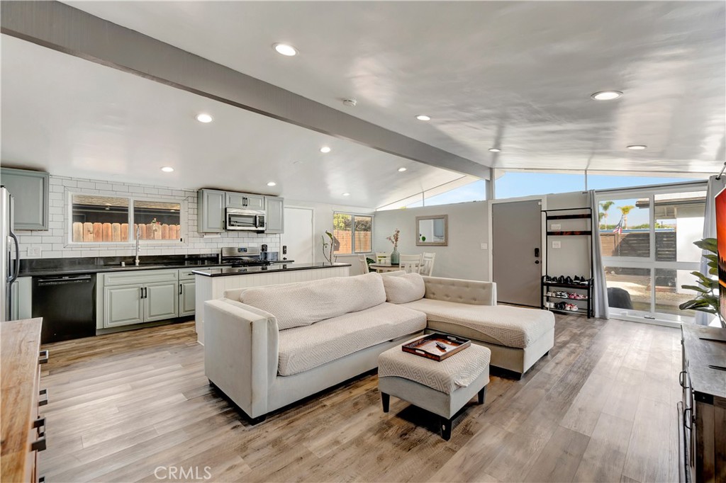1770 Wright Street Pomona, CA 91766 - Photo 5 of 70 a living room with furniture and kitchen view