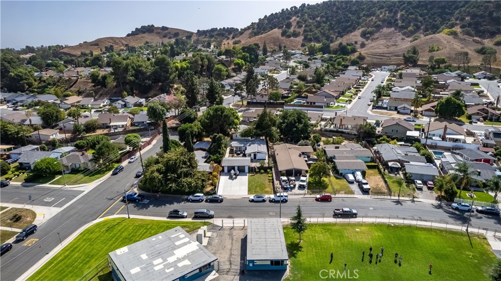 1770 Wright Street Pomona, CA 91766 - Photo 59 of 70 an aerial view of residential houses with outdoor space and swimming pool