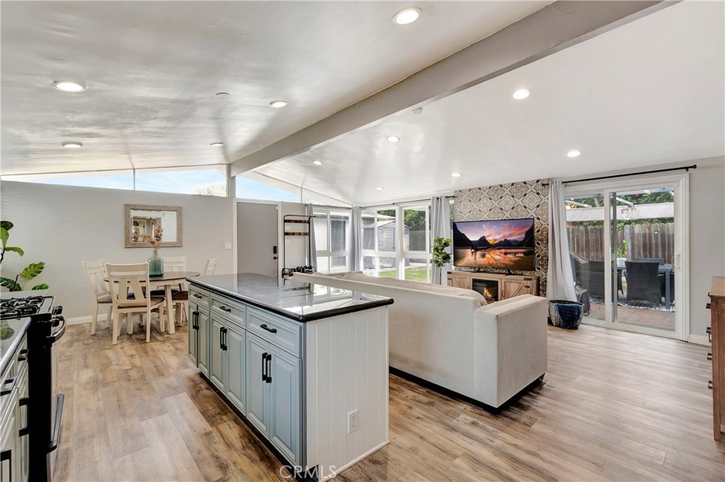 1770 Wright Street Pomona, CA 91766 - Photo 6 of 70 a kitchen with stainless steel appliances granite countertop a stove and a wooden floors