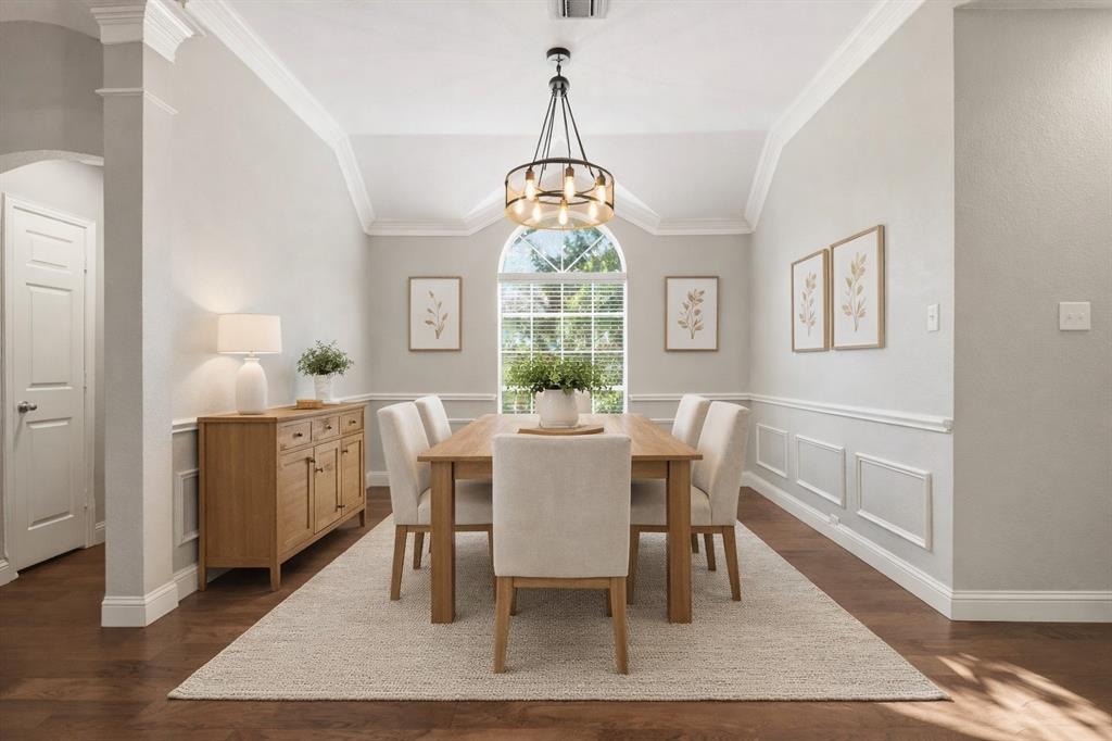2211 Post Oak Circle Corinth, TX 76210 - Photo 24 of 40 a dining room with furniture window and wooden floor