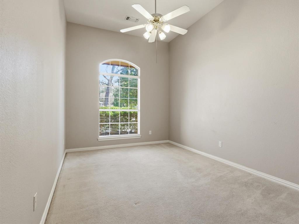2211 Post Oak Circle Corinth, TX 76210 - Photo 31 of 40 a view of an empty room with a window