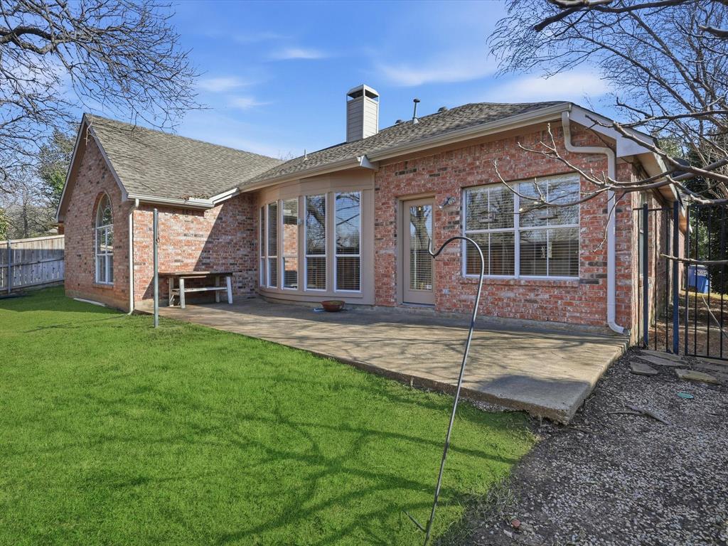 2211 Post Oak Circle Corinth, TX 76210 - Photo 37 of 40 a view of a house with a yard