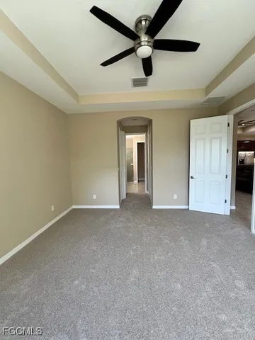 a view of an empty room and window