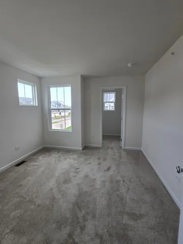 an empty room with windows