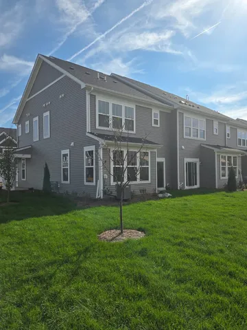 a house view with a garden space
