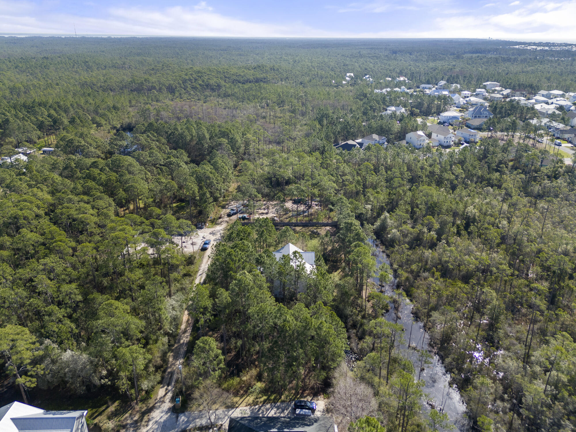 Lot 4 Calm Gulf Drive Santa Rosa Beach, FL 32459 - Photo 17 of 36 a view of a city with an outdoor space