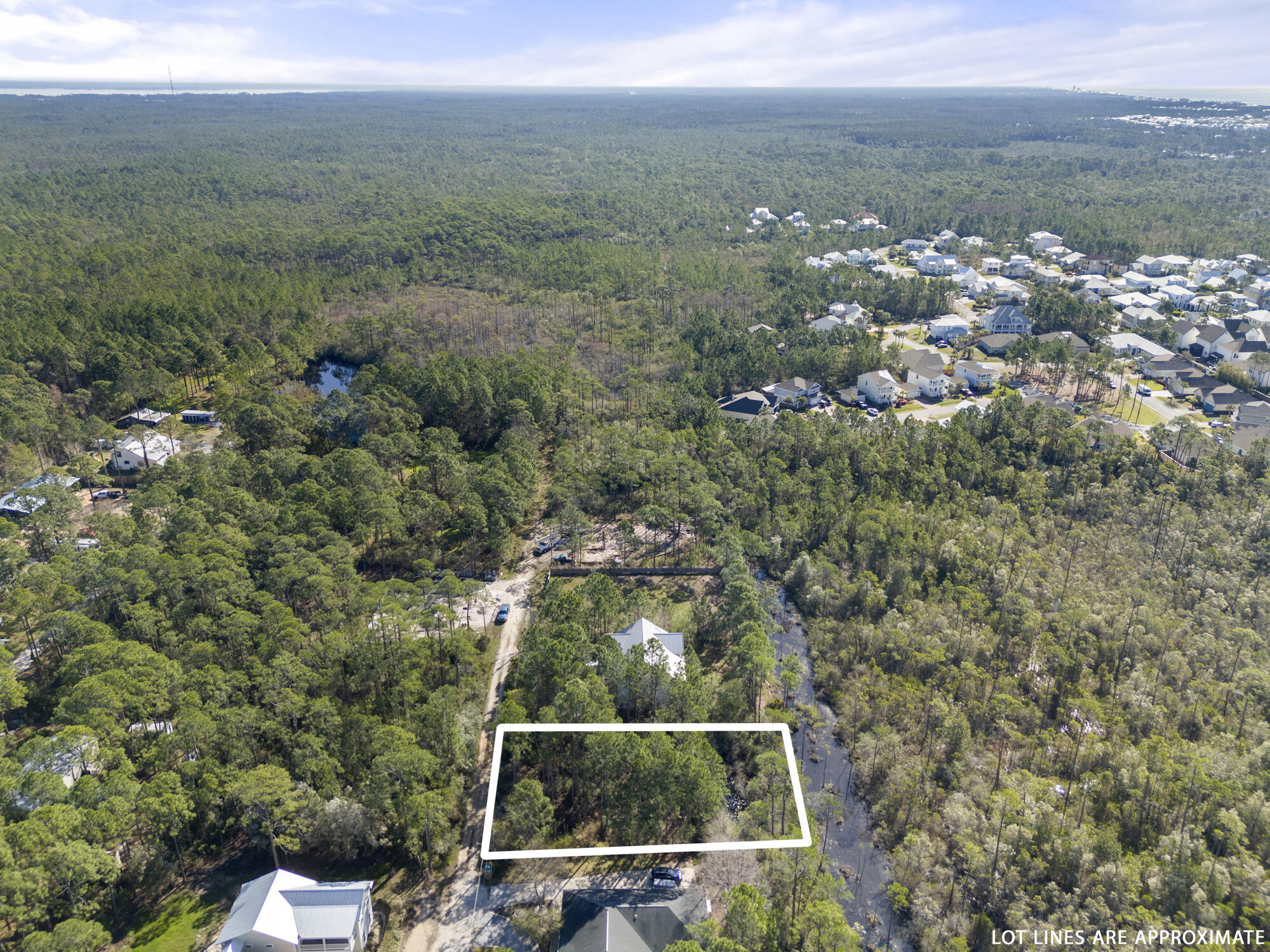 Lot 4 Calm Gulf Drive Santa Rosa Beach, FL 32459 - Photo 26 of 36 a view of a yard