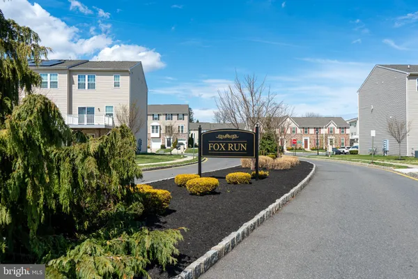 a view of a terrace with yard