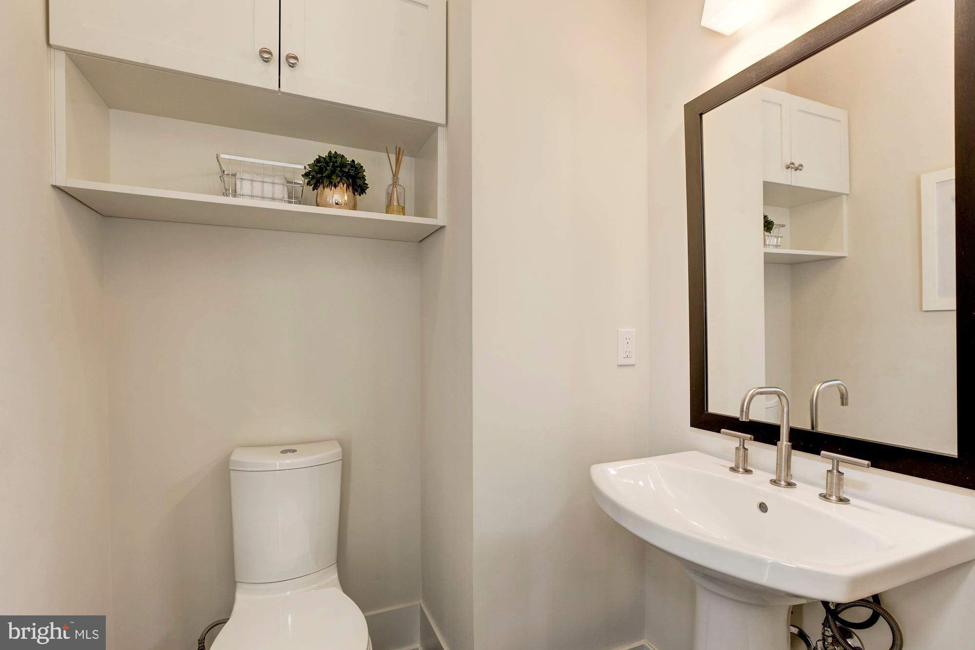 5136 Willet Bridge Road Bethesda, MD 20816 - Photo 15 of 41 2nd Level Powder Room Off of Living Areas
