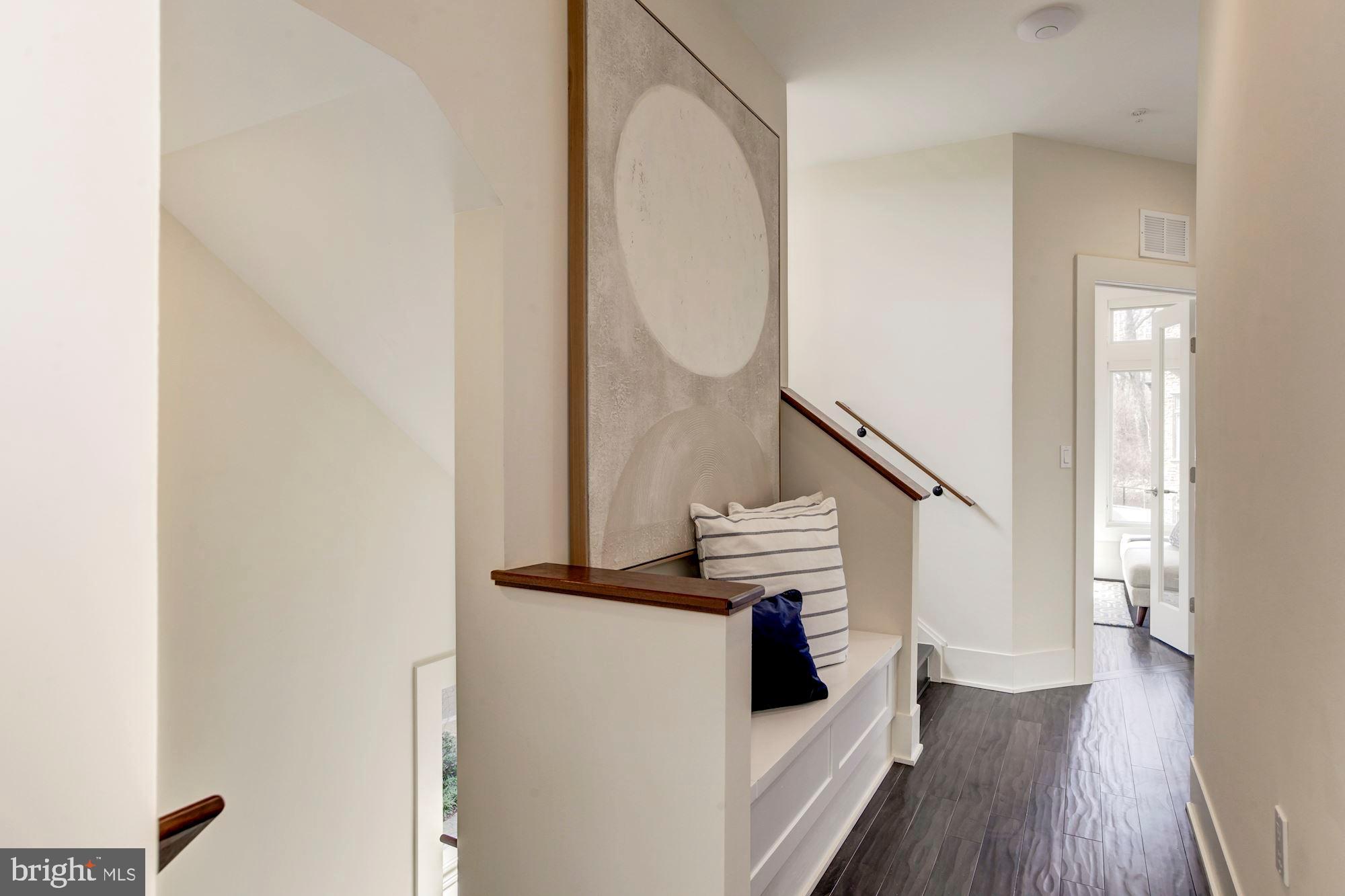 5136 Willet Bridge Road Bethesda, MD 20816 - Photo 17 of 41 Bedroom Level Hallway with Storage Bench