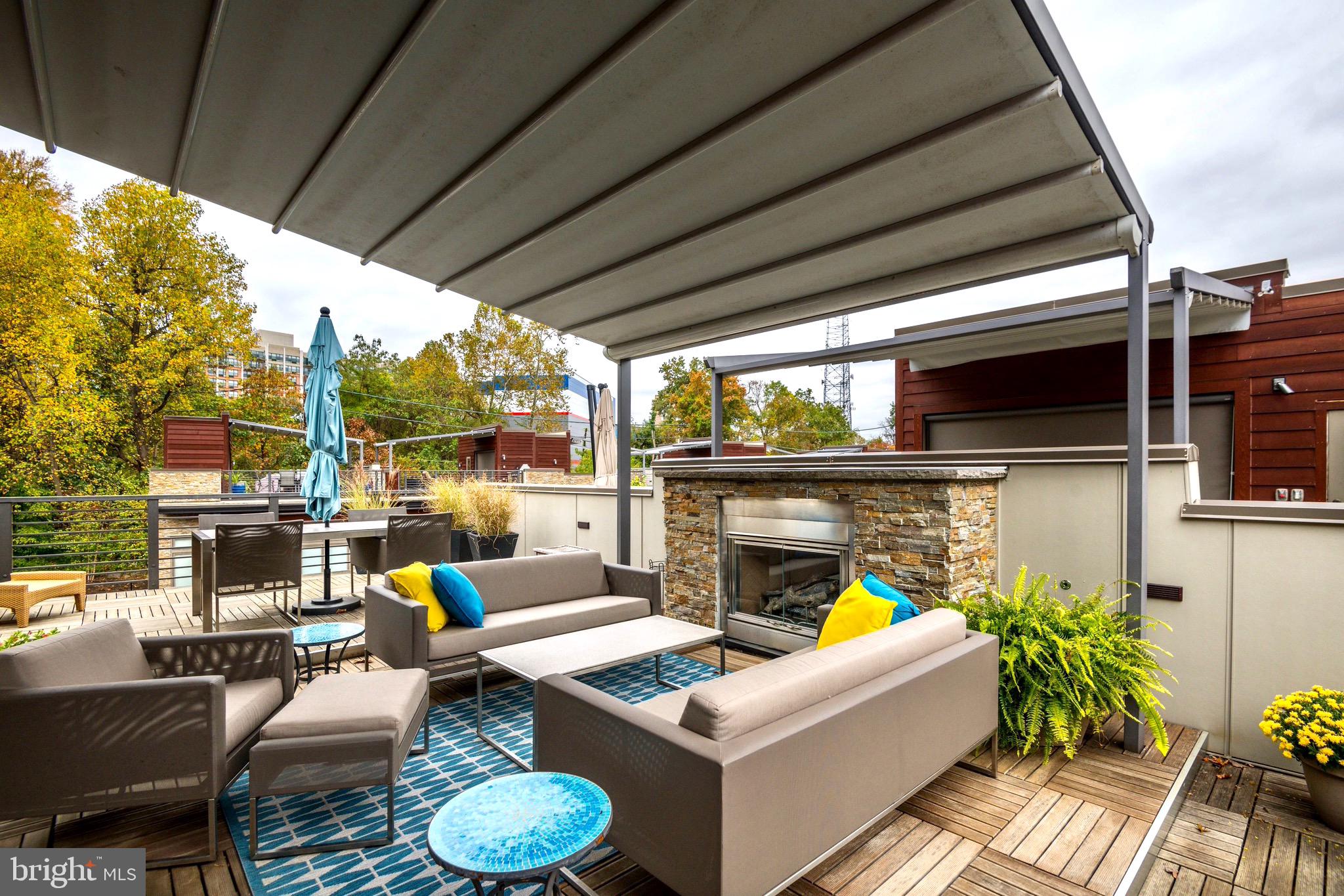 5136 Willet Bridge Road Bethesda, MD 20816 - Photo 32 of 41 Roof Deck w/ Retractable Awning & Gas Fireplace