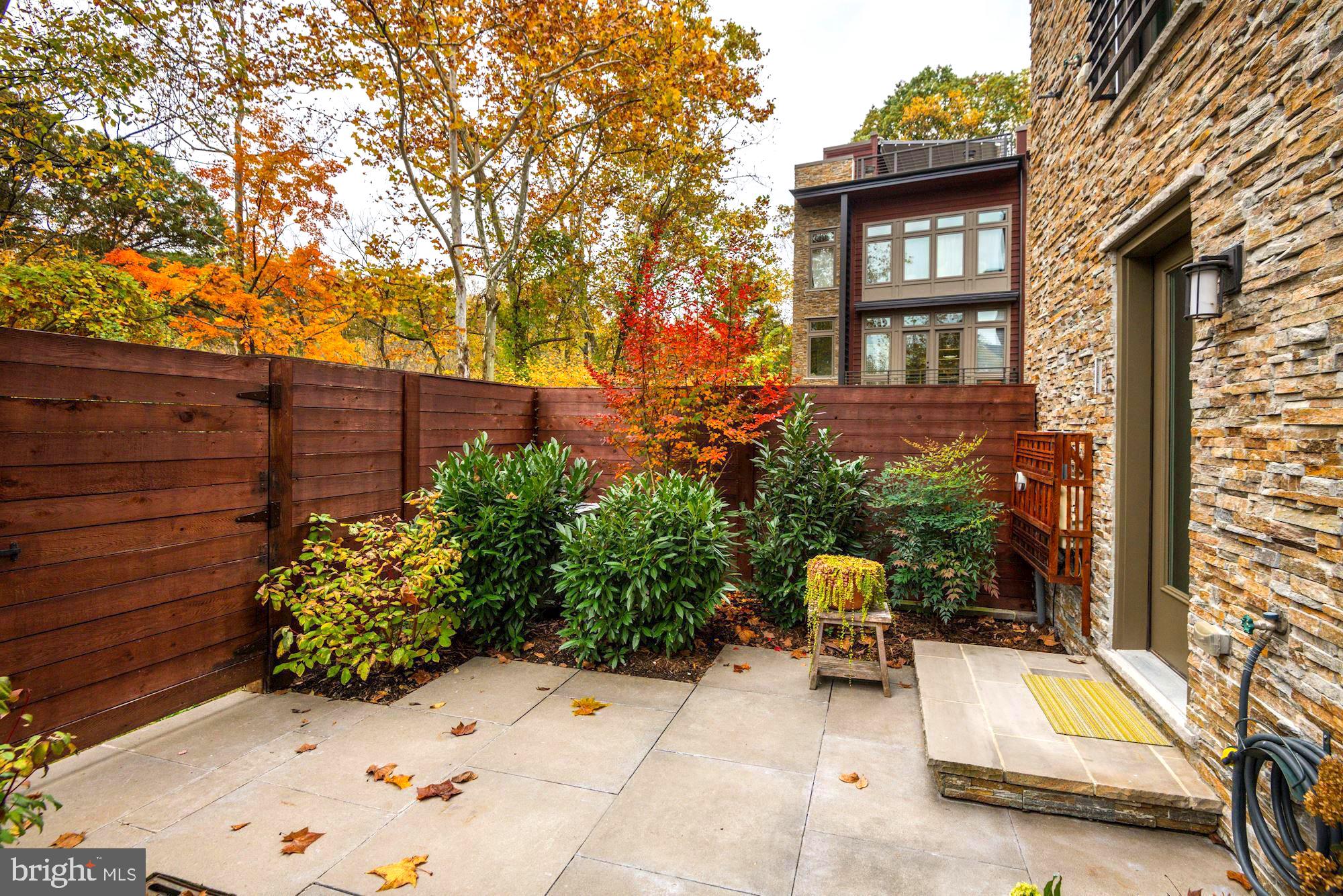 5136 Willet Bridge Road Bethesda, MD 20816 - Photo 35 of 41 Perfectly Landscaped Backyard w/ Slate Patio
