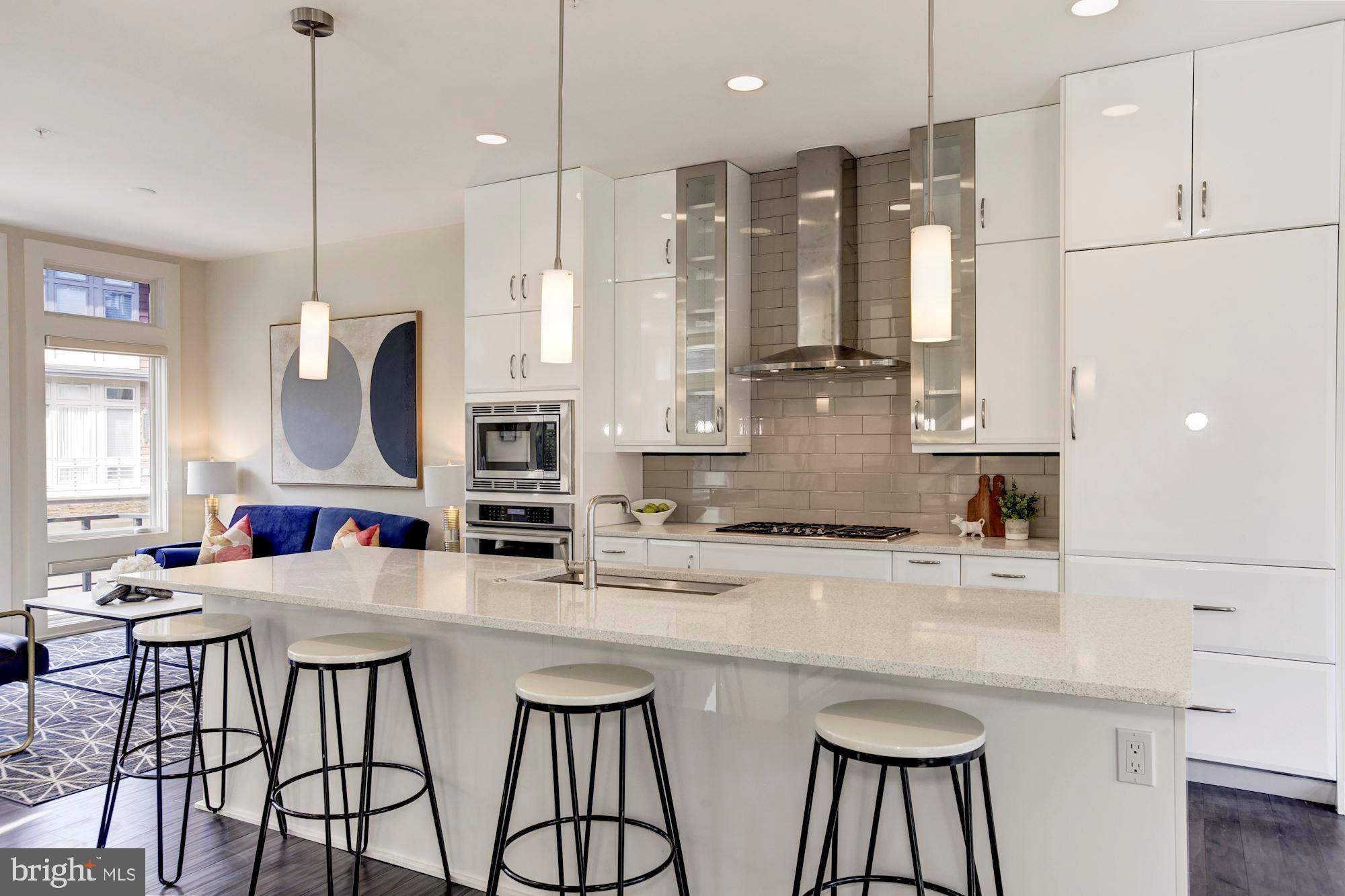 5136 Willet Bridge Road Bethesda, MD 20816 - Photo 8 of 41 Modern, Bright Kitchen is Anchors the Living Space
