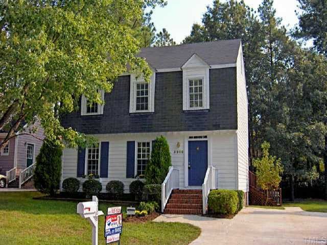 3208 Flintshire Road Raleigh, NC 27604 - Photo 1 of 1 a front view of a house with garden