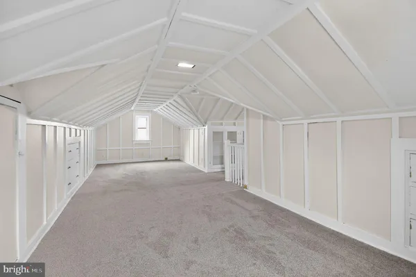 a view of a livingroom with white walls