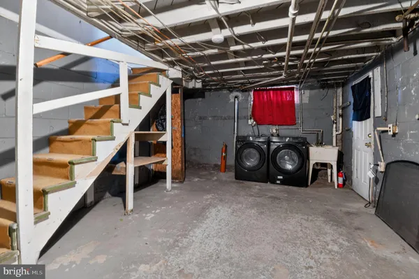 a utility room with furniture