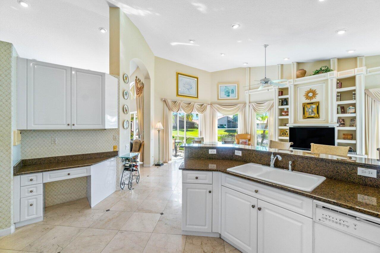7027 Falls Road East Boynton Beach, FL 33437 - Photo 16 of 33 Kitchen to Family Room