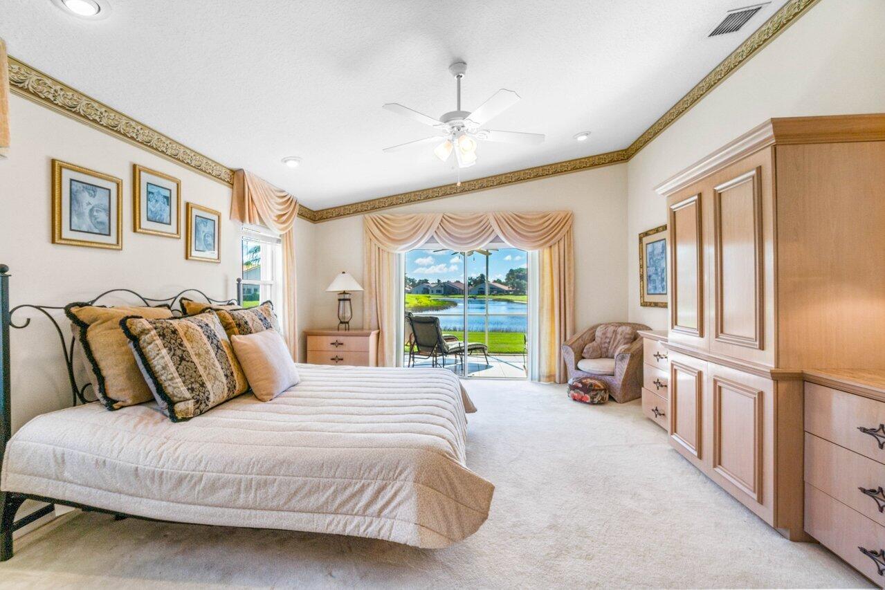 7027 Falls Road East Boynton Beach, FL 33437 - Photo 17 of 33 Master Bedroom