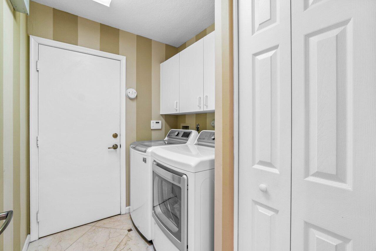 7027 Falls Road East Boynton Beach, FL 33437 - Photo 26 of 33 Laundry Room