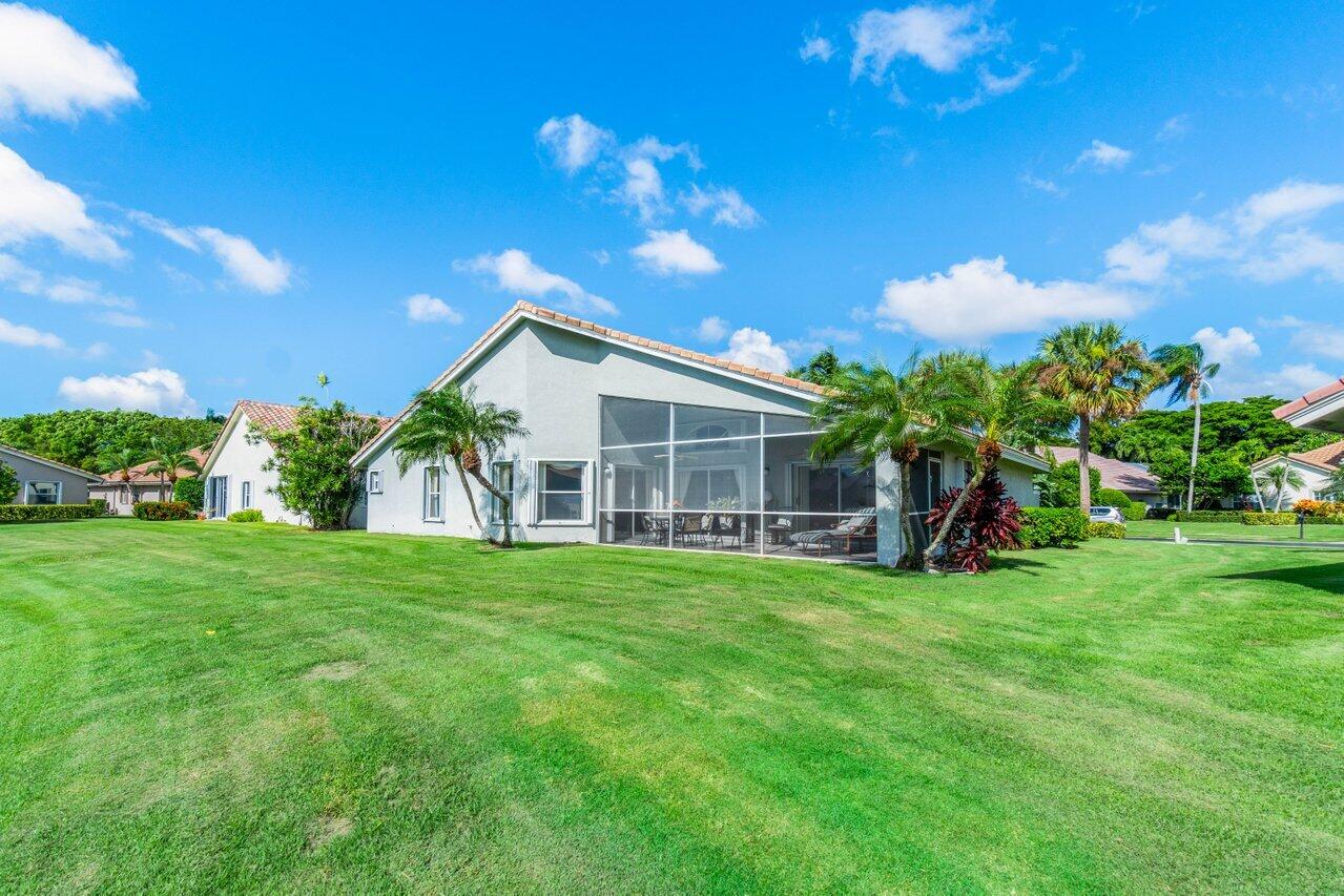 7027 Falls Road East Boynton Beach, FL 33437 - Photo 28 of 33 Rear of Hom and Yard