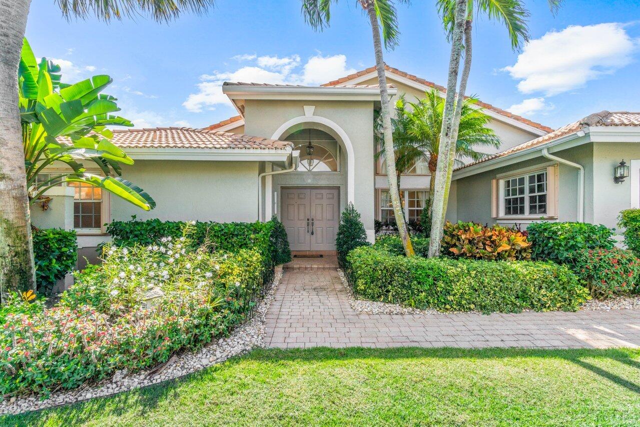 7027 Falls Road East Boynton Beach, FL 33437 - Photo 32 of 33 Front Exposure