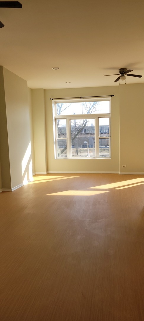 Undisclosed Address Chicago, IL 60624 - Photo 3 of 10 a view of a room with window