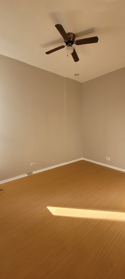 Undisclosed Address Chicago, IL 60624 - Photo 9 of 10 a view of an empty room