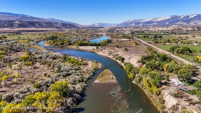 a view of a city with a lake