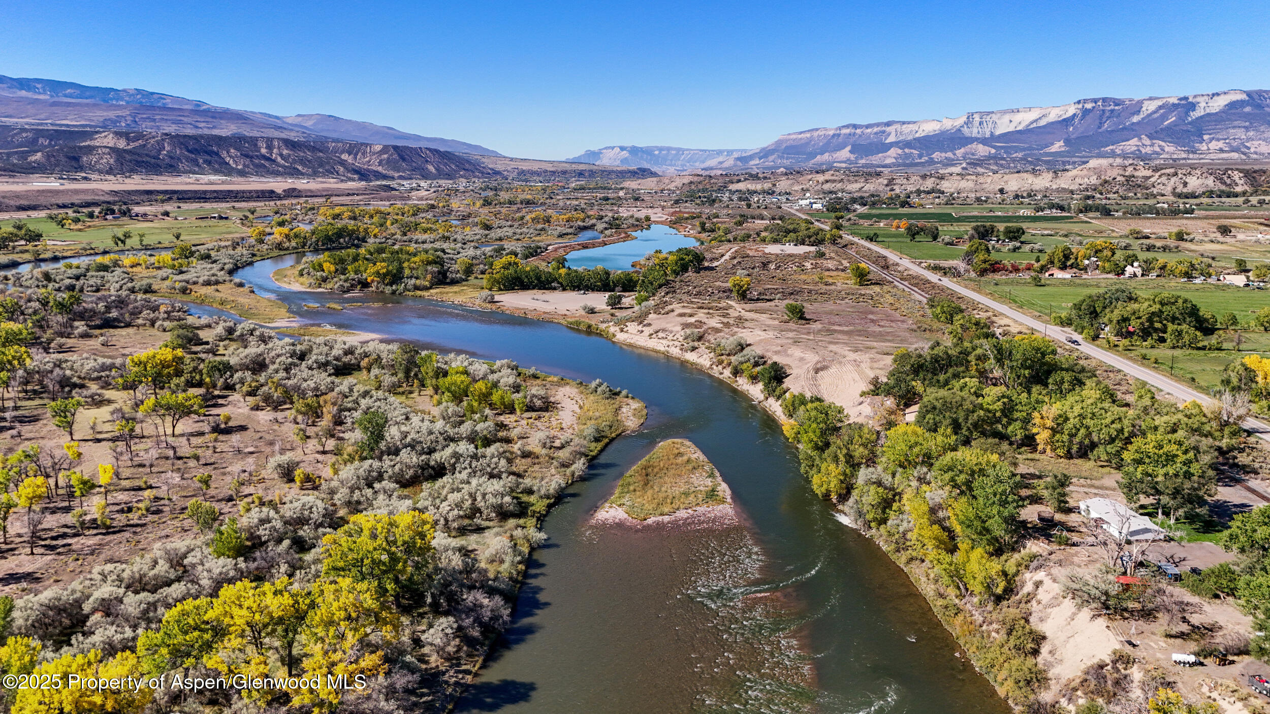 a view of a city with a lake