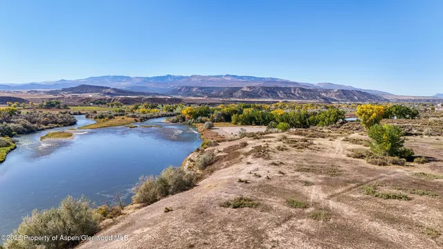 a view of a lake with a mountain