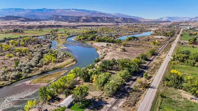 a view of a city with a lake