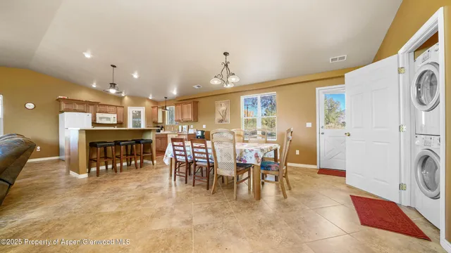 a view of a dining area with furniture