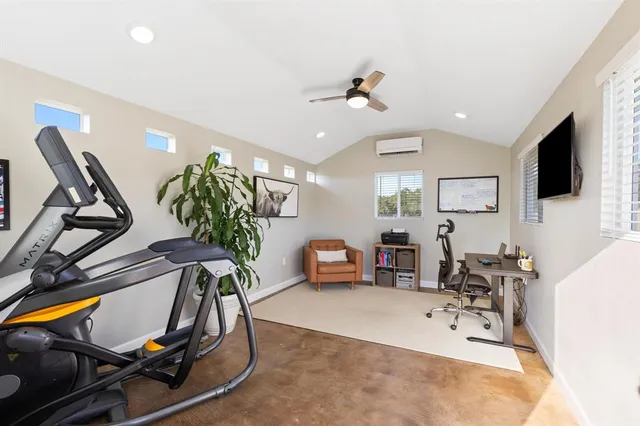 a view of a room with gym equipment