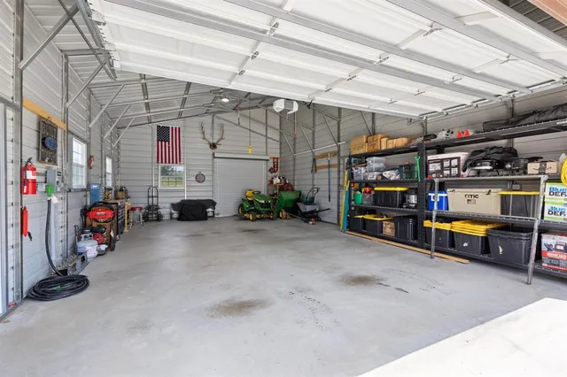 a view of garage with furniture