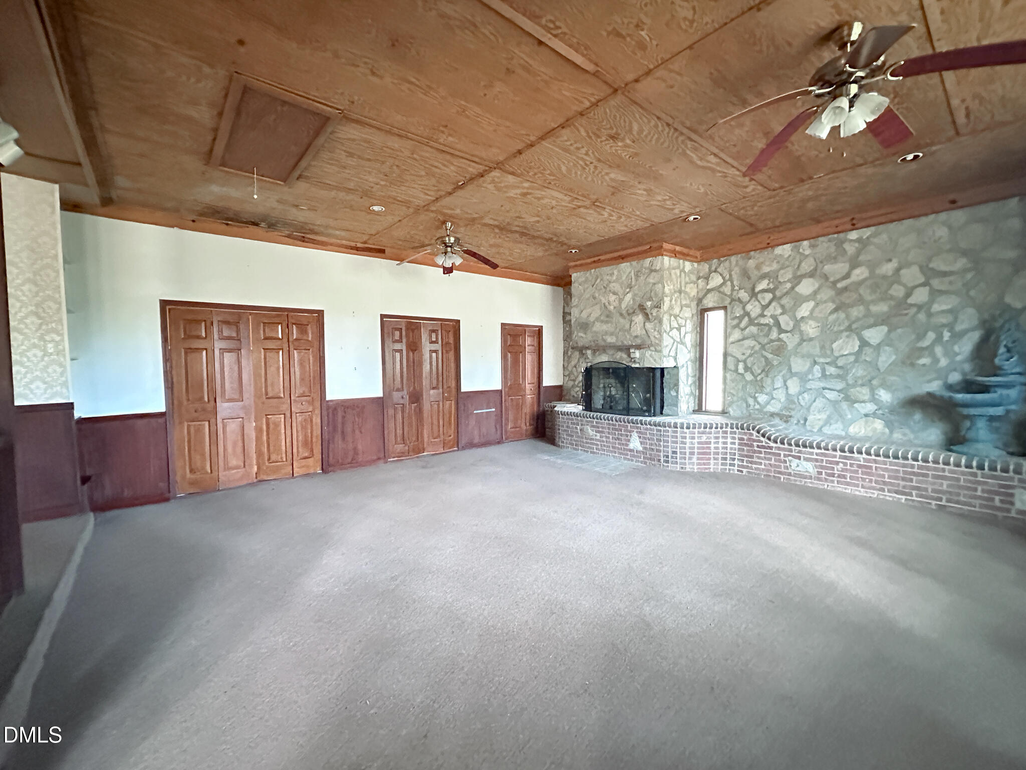 188 Jones Chapel Road Norlina, NC 27563 - Photo 60 of 71 a view of a livingroom with fireplace and window