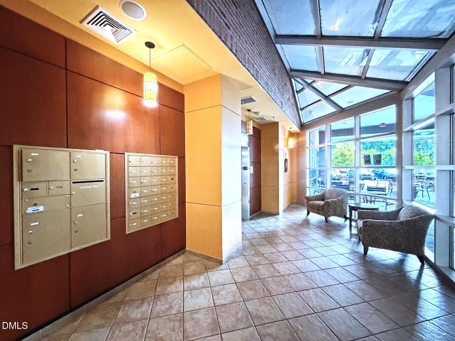 2608 Erwin Road, Unit 412 Durham, NC 27705 - Photo 23 of 45 Lobby at Main Entrance with Elevator and Mailboxes