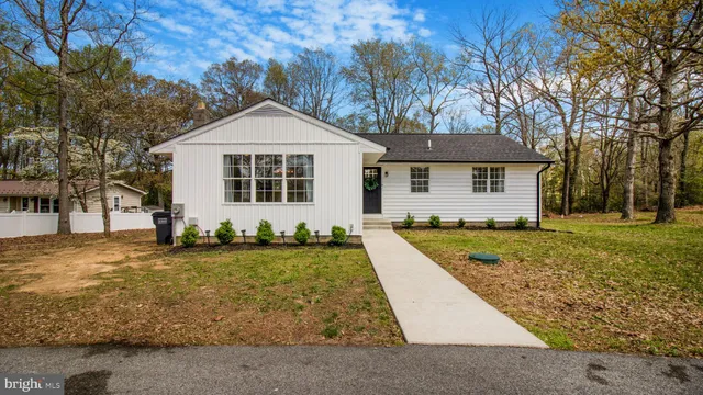 a kitchen with stainless steel appliances a refrigerator and a stove