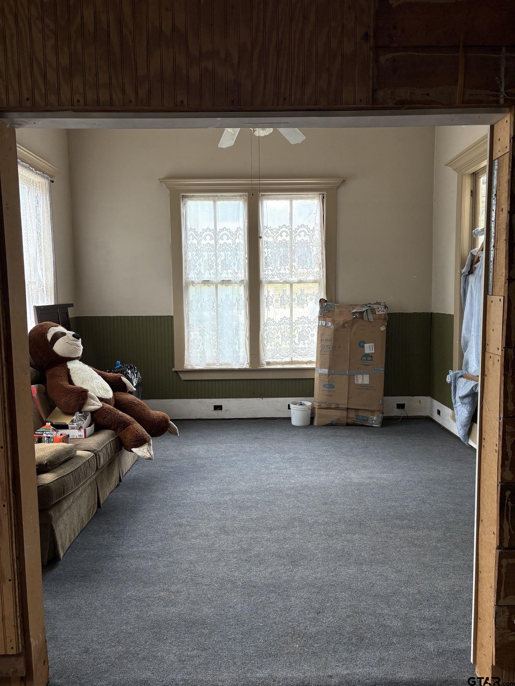 219 North Main Street Rusk, TX 75785 - Photo 5 of 11 a room with furniture and a window