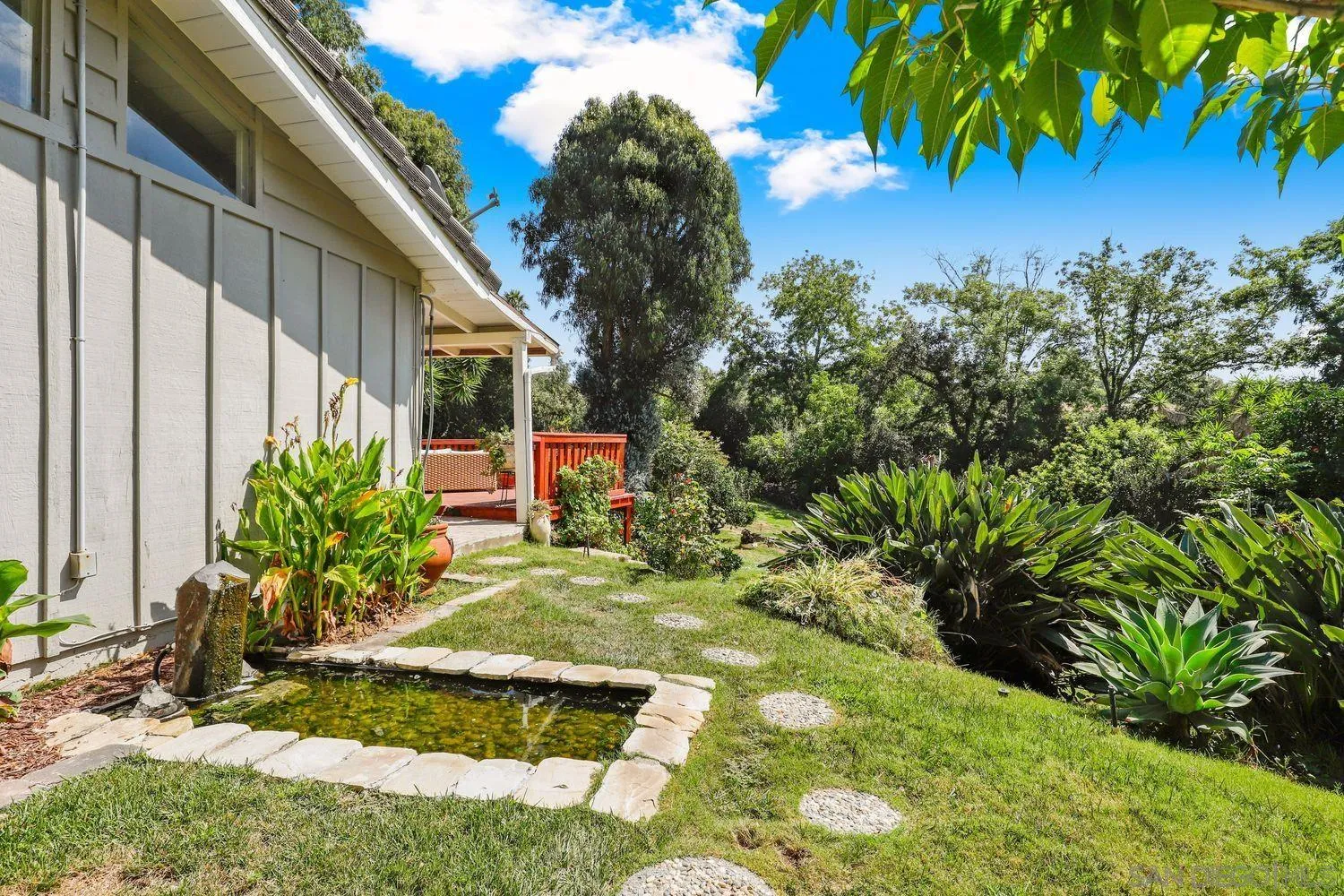 1921 Winterwarm Drive Fallbrook, CA 92028 - Photo 15 of 32 a backyard of a house with lots of green space